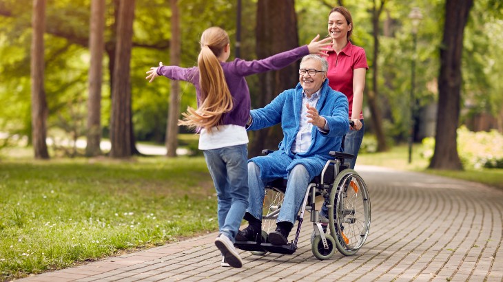 visiting hours image of family visiting grandpa from rome health near rome ny