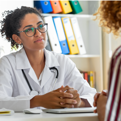 addiction medicine physician image of female doctor talking to patient at rome health near rome ny