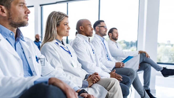 careers image of doctors listening to presentation at rome health near rome ny