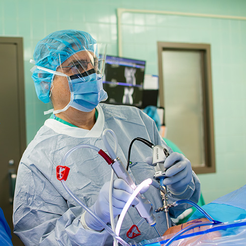 Orthopedic Surgeons listing image of doctor speaking to patient at rome health near rome ny